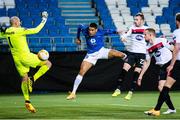 3 December 2020; Ohikhuaeme Anthony Omoijuanfo of Molde heads his side's second goal past Dundalk goalkeeper Gary Rogers and despite the attention of Cameron Dummigan during the UEFA Europa League Group B match between Molde FK and Dundalk at Molde Stadion in Molde, Norway. Photo by Marius Simensen/Sportsfile