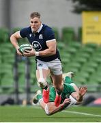 5 December 2020; Duhan van der Merwe of Scotland is tackled by Hugo Keenan of Ireland during the Autumn Nations Cup match between Ireland and Scotland at the Aviva Stadium in Dublin. Photo by Ramsey Cardy/Sportsfile