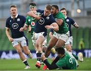 5 December 2020; Duhan van der Merwe of Scotland is tackled by Conor Murray and Bundee Aki of Ireland during the Autumn Nations Cup match between Ireland and Scotland at the Aviva Stadium in Dublin. Photo by Ramsey Cardy/Sportsfile