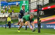 5 December 2020; Keith Earls of Ireland dives over to score his side's third try during the Autumn Nations Cup match between Ireland and Scotland at the Aviva Stadium in Dublin. Photo by Ramsey Cardy/Sportsfile