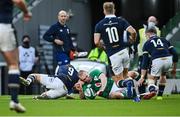5 December 2020; Keith Earls of Ireland scores his side's first try, despite the efforts of Scotland's Ali Price, during the Autumn Nations Cup match between Ireland and Scotland at the Aviva Stadium in Dublin. Photo by Seb Daly/Sportsfile
