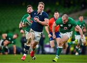 5 December 2020; Duhan van der Merwe of Scotland evades the tackle of Ireland's Jacob Stockdale on his way to scoring his side's first try during the Autumn Nations Cup match between Ireland and Scotland at the Aviva Stadium in Dublin. Photo by Seb Daly/Sportsfile