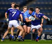 5 December 2020; Brian Howard of Dublin is tackled by Luke Fortune, left, and Pádraig Faulkner of Cavan on his way to scoring a point during the GAA Football All-Ireland Senior Championship Semi-Final match between Cavan and Dublin at Croke Park in Dublin. Photo by Ray McManus/Sportsfile