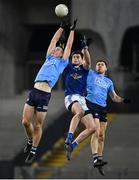 5 December 2020; Brian Fenton of Dublin gathers possession ahead of team-mate David Byrne and Thomas Galligan of Cavan during the GAA Football All-Ireland Senior Championship Semi-Final match between Cavan and Dublin at Croke Park in Dublin. Photo by Piaras Ó Mídheach/Sportsfile