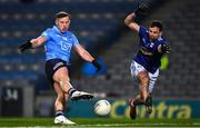 5 December 2020; Philip McMahon of Dublin has a shot on goal despite the efforts of Niall Murray of Cavan during the GAA Football All-Ireland Senior Championship Semi-Final match between Cavan and Dublin at Croke Park in Dublin. Photo by Ray McManus/Sportsfile