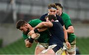 5 December 2020; Andrew Porter of Ireland is tackled by Zander Fagerson of Scotland during the Autumn Nations Cup match between Ireland and Scotland at the Aviva Stadium in Dublin. Photo by Ramsey Cardy/Sportsfile