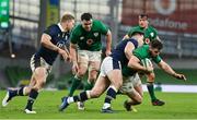 5 December 2020; Robbie Henshaw of Ireland is tackled by Huw Jones of Scotland during the Autumn Nations Cup match between Ireland and Scotland at the Aviva Stadium in Dublin. Photo by Ramsey Cardy/Sportsfile