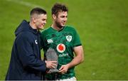 5 December 2020; Caelan Doris, right, is presented with the Player of the  Match trophy by team captain Jonathan Sexton after the Autumn Nations Cup match between Ireland and Scotland at the Aviva Stadium in Dublin. Photo by Brendan Moran/Sportsfile