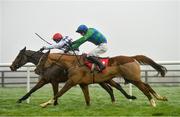 6 December 2020; Power Of Pause, right, with David Mullins up, races alongside eventual second place Crosshill, with Robbie Power up, on their way to winning the Irish Racing Industry Fundraiser For Children's Health Foundation Crumlin In Memory Of Pat Smullen Rated Novice Hurdle at Punchestown Racecourse in Kildare. Photo by Seb Daly/Sportsfile