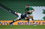 5 December 2020; Bundee Aki of Ireland is tackled by Jaco van der Walt of Scotland during the Autumn Nations Cup match between Ireland and Scotland at the Aviva Stadium in Dublin. Photo by Seb Daly/Sportsfile