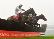 6 December 2020; Min, left, with Patrick Mullins up, jumps the last, alongside eventual second place Tornado Flyer, with Bryan Cooper up, on their way to winning the John Durkan Memorial Punchestown Steeplechase at Punchestown Racecourse in Kildare. Photo by Seb Daly/Sportsfile