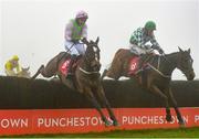 6 December 2020; Min, left, with Patrick Mullins up, jumps the last, alongside eventual second place Tornado Flyer, with Bryan Cooper up, on their way to winning the John Durkan Memorial Punchestown Steeplechase at Punchestown Racecourse in Kildare. Photo by Seb Daly/Sportsfile
