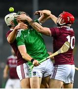 29 November 2020; William O’Donoghue of Limerick is tackled by Gearóid McInerney, left, and Joe Canning of Galway during the GAA Hurling All-Ireland Senior Championship Semi-Final match between Limerick and Galway at Croke Park in Dublin. Photo by Eóin Noonan/Sportsfile