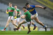 6 December 2020; Chris Barrett of Mayo in action against Steven O'Brien of Tipperary during the GAA Football All-Ireland Senior Championship Semi-Final match between Mayo and Tipperary at Croke Park in Dublin. Photo by Harry Murphy/Sportsfile