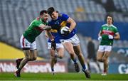 6 December 2020; Steven O'Brien of Tipperary is tackled by Kevin McLoughlin of Mayo during the GAA Football All-Ireland Senior Championship Semi-Final match between Mayo and Tipperary at Croke Park in Dublin. Photo by Brendan Moran/Sportsfile