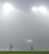 6 December 2020; Diarmuid O'Connor of Mayo beats team-mate Aidan O'Shea and Colin O'Riordan of Tipperary to catch the throw in for the start of the second half amid heavy fog during the GAA Football All-Ireland Senior Championship Semi-Final match between Mayo and Tipperary at Croke Park in Dublin. Photo by Brendan Moran/Sportsfile