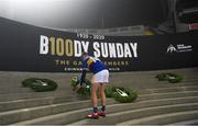 6 December 2020; Tipperary captain Conor Sweeney lays a wreath at a Bloody Sunday memorial following the GAA Football All-Ireland Senior Championship Semi-Final match between Mayo and Tipperary at Croke Park in Dublin. Photo by Ramsey Cardy/Sportsfile