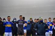 6 December 2020; Tipperary manager David Power, right, alongside captain Conor Sweeney, left, goalkeeper Evan Comerford and the rest of the team stand for a moments silence after placing a wreath at the Bloody SUnday memorial on Hill 16 after the GAA Football All-Ireland Senior Championship Semi-Final match between Mayo and Tipperary at Croke Park in Dublin. Photo by Brendan Moran/Sportsfile