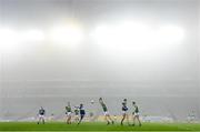 6 December 2020; Colman Kennedy of Tipperary kicks at goal under pressure from Stephen Coen of Mayo during the GAA Football All-Ireland Senior Championship Semi-Final match between Mayo and Tipperary at Croke Park in Dublin. Photo by Ramsey Cardy/Sportsfile