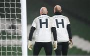 6 December 2020; Gary Rogers, left, and Aaron McCarey of Dundalk warm-up wearing a t-shirt in tribute to the late Dundalk groundsman and videographer Harry Taaffe prior to the Extra.ie FAI Cup Final match between Shamrock Rovers and Dundalk at the Aviva Stadium in Dublin. Photo by Stephen McCarthy/Sportsfile