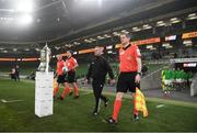 6 December 2020; Match officials, from right, assistant referee Darren Corcoran, fourth official Sean Grant, referee Robert Harvey and assistant referee Alan Sherlock walk out prior to the Extra.ie FAI Cup Final match between Shamrock Rovers and Dundalk at the Aviva Stadium in Dublin. Photo by Stephen McCarthy/Sportsfile