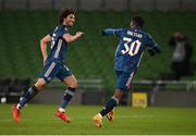 10 December 2020; Mohamed Elneny, left, of Arsenal celebrates with team-mate Eddie Nketiah after scoring his side's second goal during the UEFA Europa League Group B match between Dundalk and Arsenal at the Aviva Stadium in Dublin. Photo by Stephen McCarthy/Sportsfile