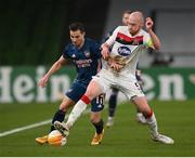 10 December 2020; Cédric of Arsenal in action against Chris Shields of Dundalk during the UEFA Europa League Group B match between Dundalk and Arsenal at the Aviva Stadium in Dublin. Photo by Stephen McCarthy/Sportsfile