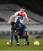 10 December 2020; Folarin Balogun of Arsenal in action against Brian Gartland of Dundalk during the UEFA Europa League Group B match between Dundalk and Arsenal at the Aviva Stadium in Dublin. Photo by Stephen McCarthy/Sportsfile