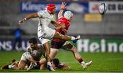 11 December 2020; Cheslin Kolbe of Toulouse kicks down field under pressure from Michael Lowry of Ulster during the Heineken Champions Cup Pool B Round 1 match between Ulster and Toulouse at Kingspan Stadium in Belfast. Photo by Ramsey Cardy/Sportsfile
