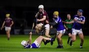 11 December 2020; John Fleming of Galway in action against John Maher, Mark Hennessy and Ciaran Burke of Laois during the Bord Gáis Energy Leinster GAA Hurling U20 Championship Quarter-Final match between Laois and Galway at MW O'Moore Park in Portlaoise, Co Laois. Photo by Matt Browne/Sportsfile