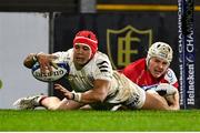 11 December 2020; Cheslin Kolbe of Toulouse goes over to score his side's fourth try despite the tackle of Michael Lowry of Ulster during the Heineken Champions Cup Pool B Round 1 match between Ulster and Toulouse at Kingspan Stadium in Belfast. Photo by Ramsey Cardy/Sportsfile