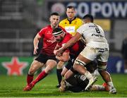 11 December 2020; Rob Herring of Ulster is tackled by Rynhardt Elstadt, hidden, and Selevasio Tolofua of Toulouse, right, during the Heineken Champions Cup Pool B Round 1 match between Ulster and Toulouse at Kingspan Stadium in Belfast. Photo by Ramsey Cardy/Sportsfile
