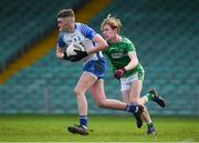 12 December 2020; Ger Hahessy of Waterford in action against Oisin Enright of Limerick during the Electric Ireland Munster GAA Football Minor Championship Quarter-Final match between Limerick and Waterford at LIT Gaelic Grounds in Limerick. Photo by Matt Browne/Sportsfile