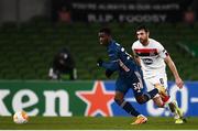 10 December 2020; Eddie Nketiah of Arsenal and Jordan Flores of Dundalk during the UEFA Europa League Group B match between Dundalk and Arsenal at the Aviva Stadium in Dublin. Photo by Ben McShane/Sportsfile