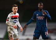 10 December 2020; Nicolas Pépé of Arsenal and Darragh Leahy of Dundalk during the UEFA Europa League Group B match between Dundalk and Arsenal at the Aviva Stadium in Dublin. Photo by Ben McShane/Sportsfile