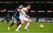 10 December 2020; Daniel Kelly of Dundalk and Cédric of Arsenal during the UEFA Europa League Group B match between Dundalk and Arsenal at the Aviva Stadium in Dublin. Photo by Ben McShane/Sportsfile