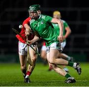 12 December 2020; Mark Quinlan of Limerick in action against Tommy O'Connell of Cork during the Bord Gáis Energy Munster GAA Hurling U20 Championship Semi-Final match between Limerick and Cork at LIT Gaelic Grounds in Limerick. Photo by Matt Browne/Sportsfile