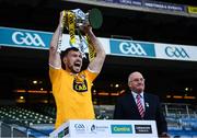 13 December 2020; Antrim captain Conor McCann lifts the Joe McDonagh Cup as Uachtarán Chumann Lúthchleas Gael John Horan looks on following the Joe McDonagh Cup Final match between Kerry and Antrim at Croke Park in Dublin. Photo by Ray McManus/Sportsfile