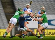 13 December 2020; Limerick players, from left, William O'Donoghue, goalkeeper Nickie Quaid and Seán Finn combine to block the shot of Neil Montgomery of Waterford during the GAA Hurling All-Ireland Senior Championship Final match between Limerick and Waterford at Croke Park in Dublin. Photo by Stephen McCarthy/Sportsfile
