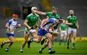 13 December 2020; Patrick Curran of Waterford in action against William O'Donoghue of Limerick during the GAA Hurling All-Ireland Senior Championship Final match between Limerick and Waterford at Croke Park in Dublin. Photo by Ramsey Cardy/Sportsfile