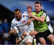 13 December 2020; Kurtley Beale of Racing 92 is tackled by Jack Carty and John Porch of Connacht during the Heineken Champions Cup Pool B Round 1 match between Racing 92 and Connacht at La Defense Arena in Paris, France. Photo by Harry Murphy/Sportsfile