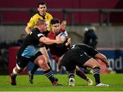 13 December 2020; Conor Murray of Munster is tackled by Wilco Louw, left, and Joe Marler of Harlequins during the Heineken Champions Cup Pool B Round 1 match between Munster and Harlequins at Thomond Park in Limerick. Photo by Seb Daly/Sportsfile