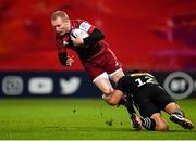 13 December 2020; Keith Earls of Munster is tackled by Ben Tapuai of Harlequins during the Heineken Champions Cup Pool B Round 1 match between Munster and Harlequins at Thomond Park in Limerick. Photo by Seb Daly/Sportsfile