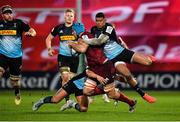 13 December 2020; Tadhg Beirne of Munster is tackled by Marcus Smith and Nathan Earle of Harlequins during the Heineken Champions Cup Pool B Round 1 match between Munster and Harlequins at Thomond Park in Limerick. Photo by Seb Daly/Sportsfile