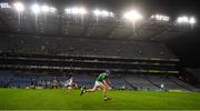 13 December 2020; David Reidy of Limerick solos the sliotar in front of an empty Hogan Stand during the GAA Hurling All-Ireland Senior Championship Final match between Limerick and Waterford at Croke Park in Dublin. Photo by Brendan Moran/Sportsfile