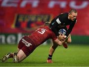 13 December 2020; Will Edwards of Harlequins is tackled by Chris Farrell of Munster during the Heineken Champions Cup Pool B Round 1 match between Munster and Harlequins at Thomond Park in Limerick. Photo by Seb Daly/Sportsfile
