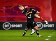 13 December 2020; Keith Earls of Munster is tackled by Ben Tapuai of Harlequins during the Heineken Champions Cup Pool B Round 1 match between Munster and Harlequins at Thomond Park in Limerick. Photo by Seb Daly/Sportsfile