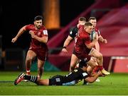 13 December 2020; Andrew Conway of Munster is tackled by Ben Tapuai of Harlequins during the Heineken Champions Cup Pool B Round 1 match between Munster and Harlequins at Thomond Park in Limerick. Photo by Seb Daly/Sportsfile