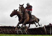 18 December 2020; Jukebox Jive, right, with Colin McNamara up, jumps the last alongside eventual second place King Alex, with Mark Bolger up, on their way to winning the BetVictor Gamble Responsibly Tara Handicap Hurdle at Navan Racecourse in Meath. Photo by Seb Daly/Sportsfile