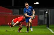18 December 2020; Niall Comerford of Leinster in action against Seán French of Munster during the A Interprovincial Friendly match between Munster A and Leinster A at Thomond Park in Limerick. Photo by Brendan Moran/Sportsfile